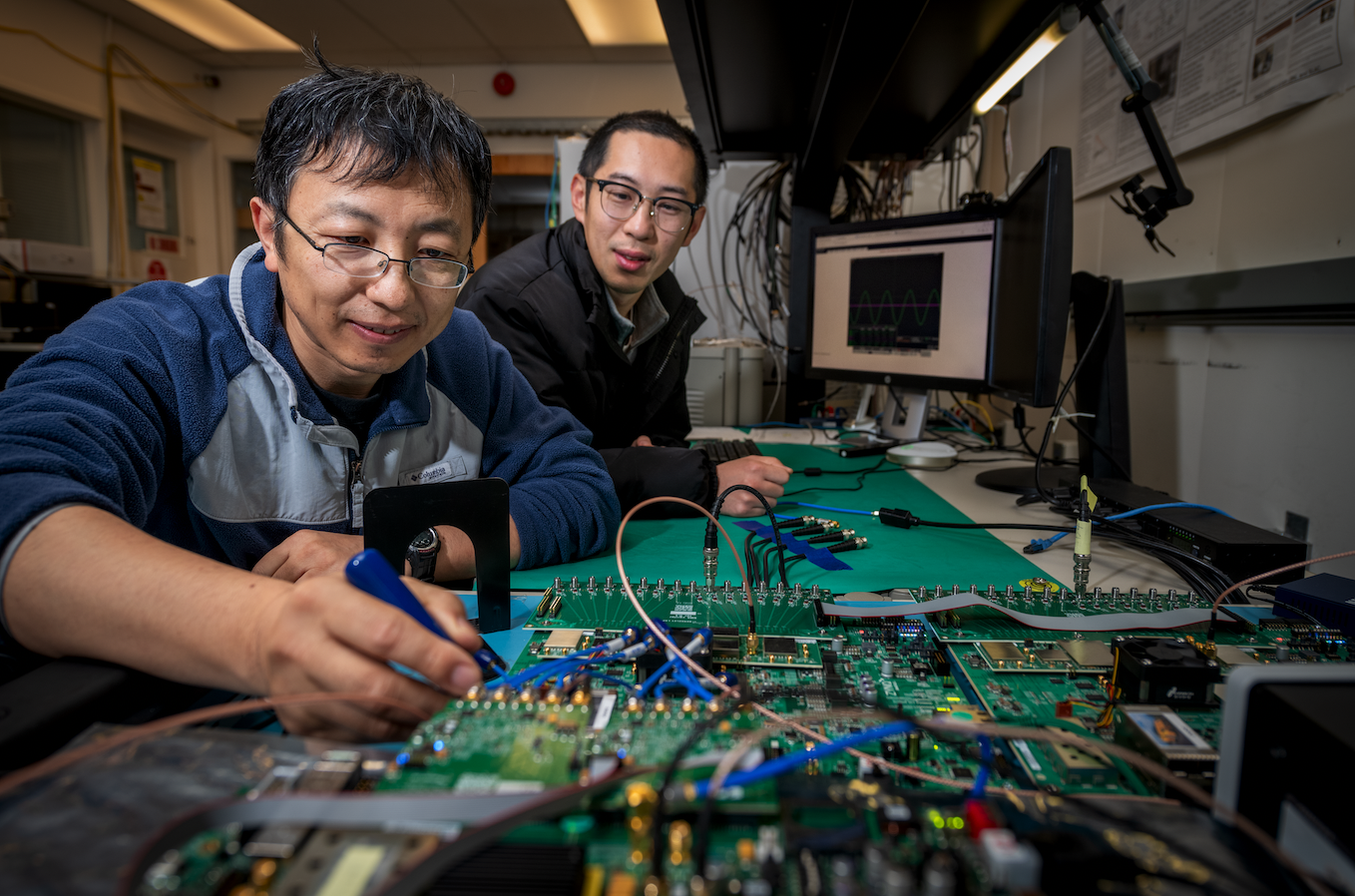 QubiC co-designers, co-leads Gang Huang and Yilun Xu